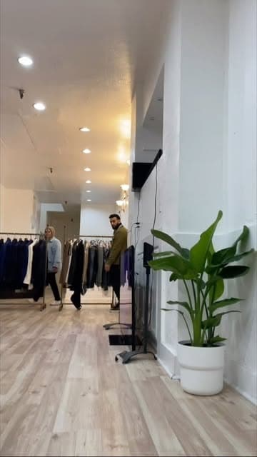 Interior of the Noori Stitch shop with garment racks